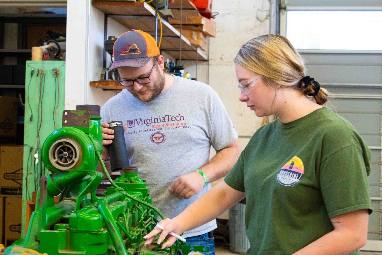 students researching engine in classroom